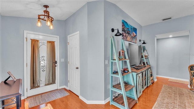 2602 Whitewood Rd, Mulberry, FL 33860 - foyer entrance with wood finished floors and baseboards