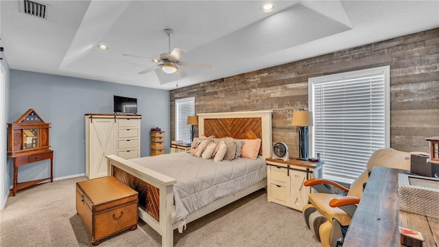 2602 Whitewood Rd, Mulberry, FL 33860 - bedroom featuring an accent wall, light colored carpet, recessed lighting, ceiling fan, and wooden walls