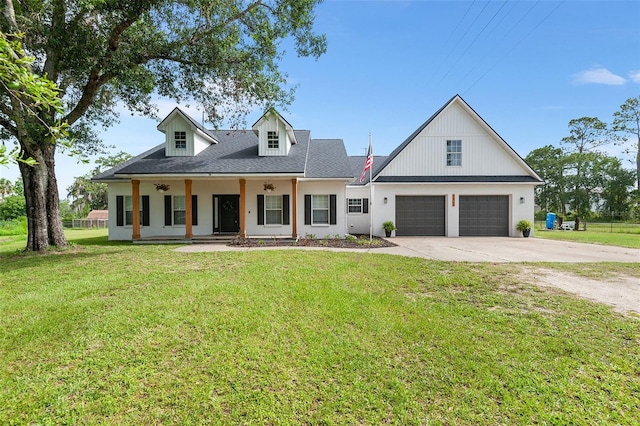 5820 E Johnson Ave, Haines City, FL 33844 - modern inspired farmhouse with driveway, a front yard, a porch, and stucco siding