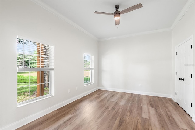 5820 E Johnson Ave, Haines City, FL 33844 - spare room featuring crown molding, light wood finished floors, and a ceiling fan