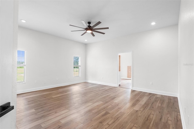 5820 E Johnson Ave, Haines City, FL 33844 - empty room featuring ceiling fan, wood finished floors, and recessed lighting