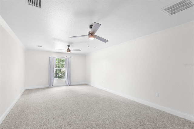 5820 E Johnson Ave, Haines City, FL 33844 - spare room featuring light colored carpet and ceiling fan