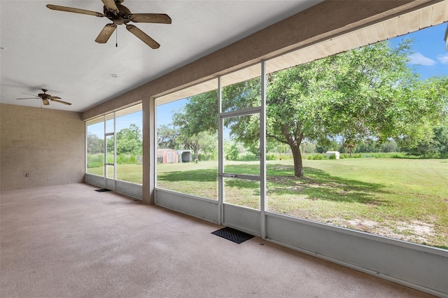 5820 E Johnson Ave, Haines City, FL 33844 - unfurnished sunroom featuring a ceiling fan