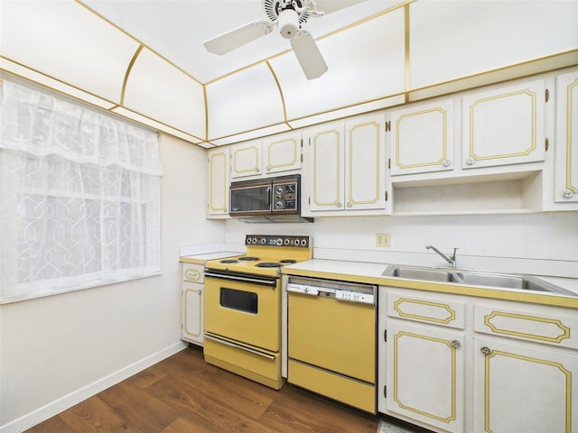 700 Mirror Ter NW Unit 702, Winter Haven, FL 33881 - kitchen featuring black microwave, dishwashing machine, range with electric cooktop, ceiling fan, and light countertops