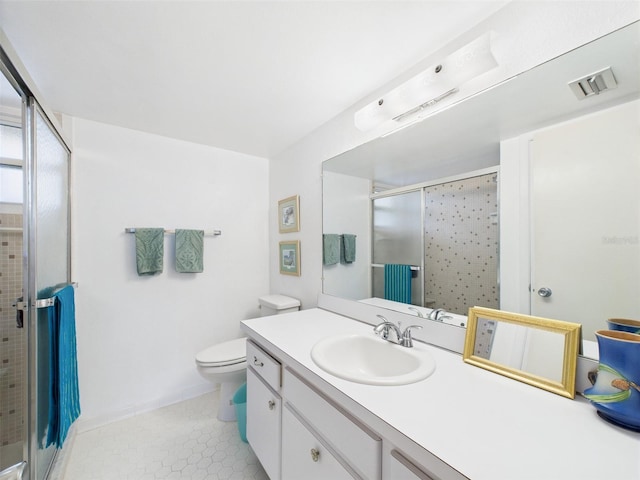 700 Mirror Ter NW Unit 702, Winter Haven, FL 33881 - full bathroom featuring a shower stall, vanity, and tile patterned flooring