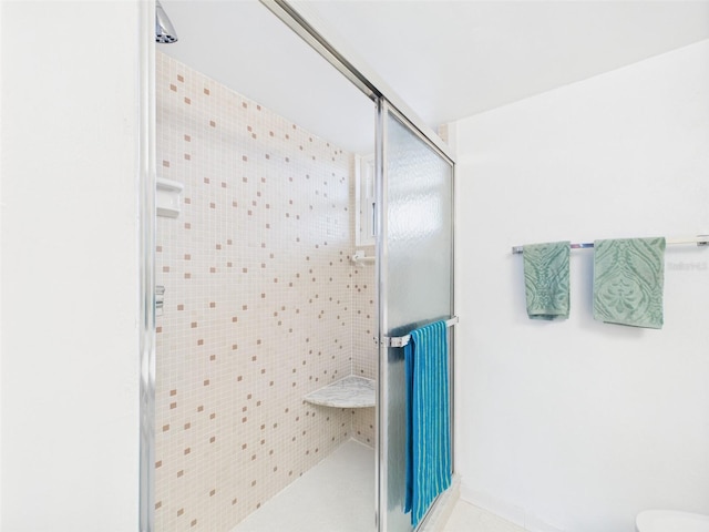 700 Mirror Ter NW Unit 702, Winter Haven, FL 33881 - full bath featuring a shower stall and tile patterned flooring