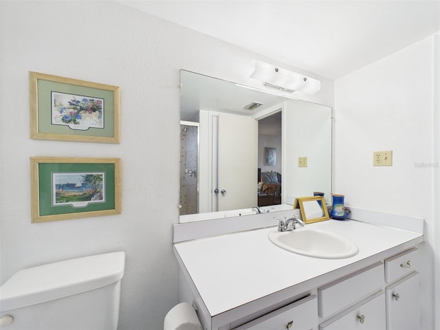 700 Mirror Ter NW Unit 702, Winter Haven, FL 33881 - bathroom with toilet and vanity