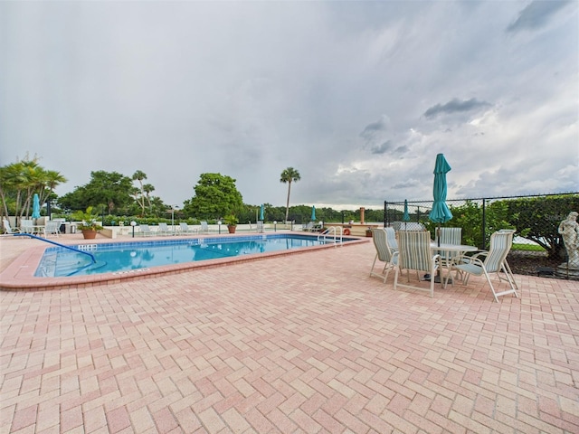 700 Mirror Ter NW Unit 702, Winter Haven, FL 33881 - community pool with a patio