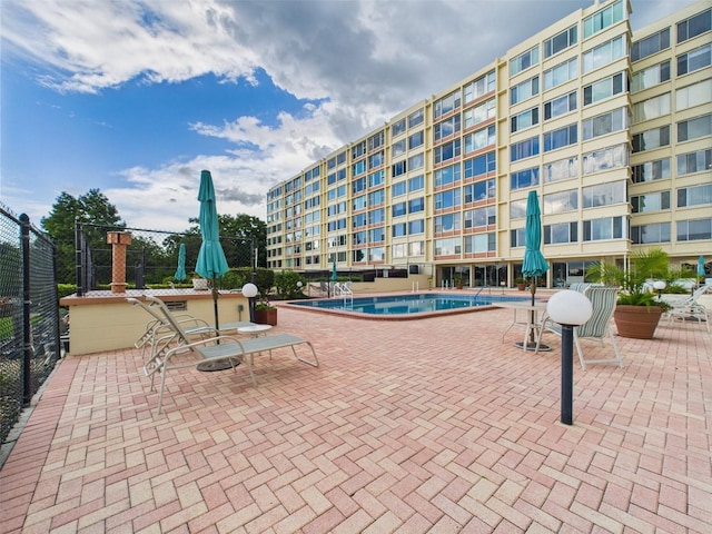 700 Mirror Ter NW Unit 702, Winter Haven, FL 33881 - community pool with a patio area