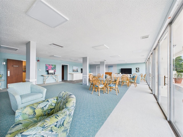 700 Mirror Ter NW Unit 702, Winter Haven, FL 33881 - common area with a textured ceiling