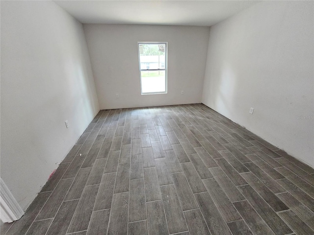 602 Lime Ave, Dundee, FL 33838 - spare room featuring dark wood-type flooring