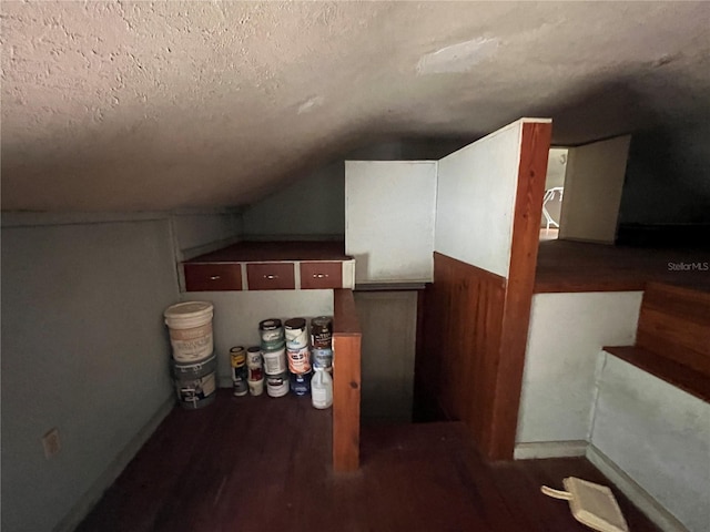 1805 S Lake Reedy Blvd, Frostproof, FL 33843 - additional living space featuring vaulted ceiling, a textured ceiling, and wood finished floors