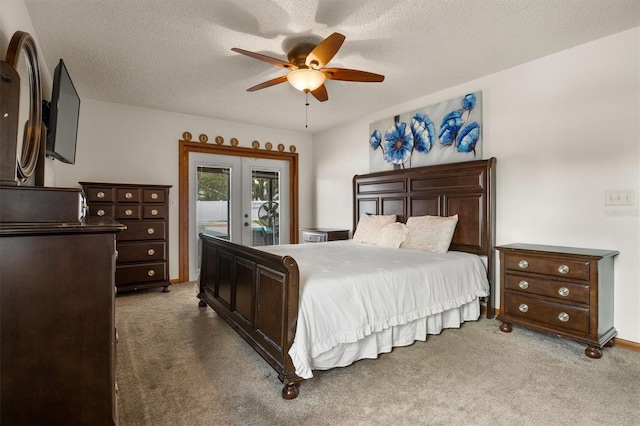 704 Butternut Pl, Lakeland, FL 33813 - bedroom featuring french doors, access to exterior, carpet floors, a ceiling fan, and a textured ceiling