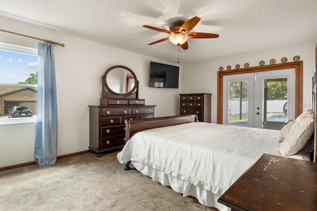 704 Butternut Pl, Lakeland, FL 33813 - carpeted bedroom with french doors, access to exterior, ceiling fan, and a textured ceiling