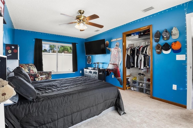 704 Butternut Pl, Lakeland, FL 33813 - carpeted bedroom featuring a closet and a ceiling fan