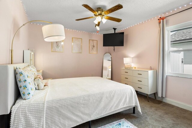 704 Butternut Pl, Lakeland, FL 33813 - carpeted bedroom with a textured ceiling