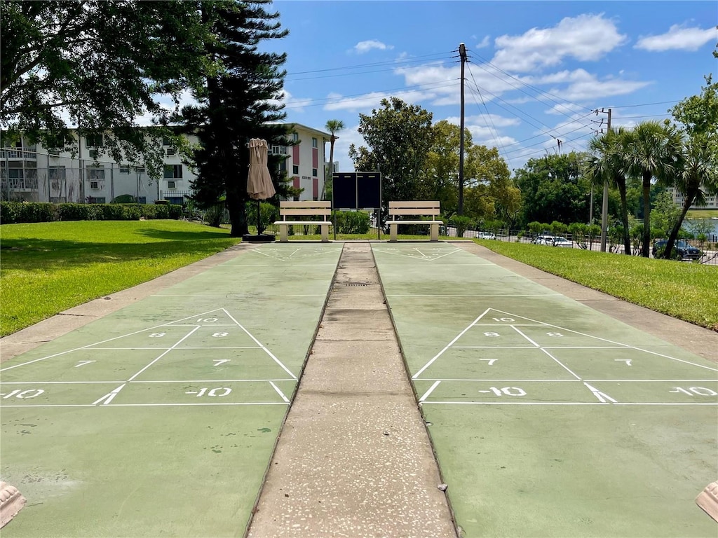 1776 6th St NW Unit 709, Winter Haven, FL 33881 - view of home's community featuring a yard and shuffleboard
