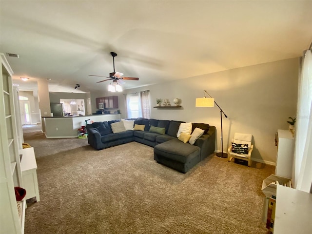 1790 Turtle Rock Dr, Lakeland, FL 33803 - living room with carpet, a ceiling fan, and lofted ceiling