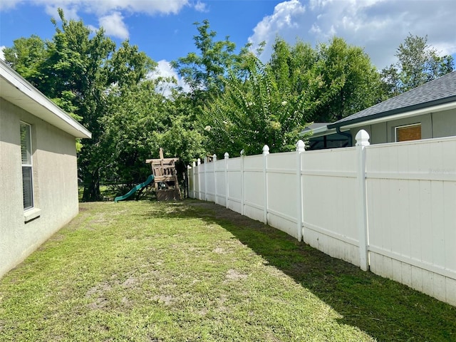 1790 Turtle Rock Dr, Lakeland, FL 33803 - view of yard with a playground and view of scattered trees
