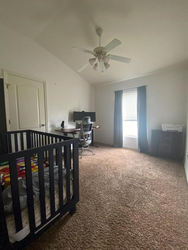1790 Turtle Rock Dr, Lakeland, FL 33803 - carpeted bedroom with vaulted ceiling, an office area, and a ceiling fan