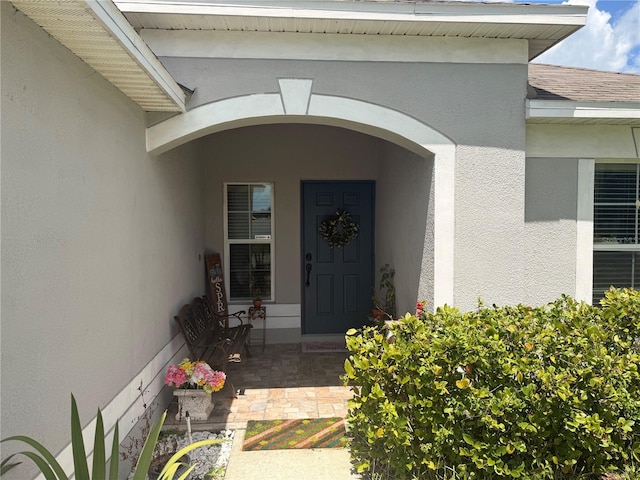 13443 Graham Yarden Dr, Riverview, FL 33579 - doorway to property featuring stucco siding