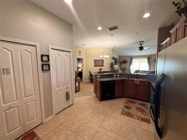 13443 Graham Yarden Dr, Riverview, FL 33579 - kitchen featuring freestanding refrigerator, black dishwasher, recessed lighting, light tile patterned flooring, and a peninsula