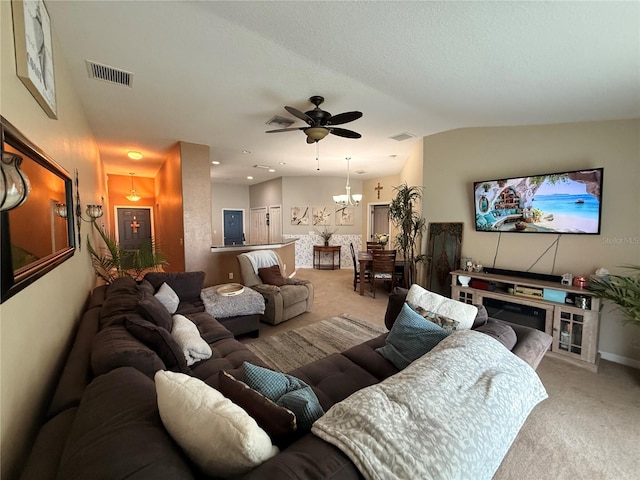13443 Graham Yarden Dr, Riverview, FL 33579 - living room featuring carpet flooring, a ceiling fan, lofted ceiling, and a chandelier