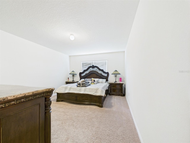5751 Lakeside Landings Blvd, Winter Haven, FL 33881 - bedroom featuring light colored carpet and a textured ceiling