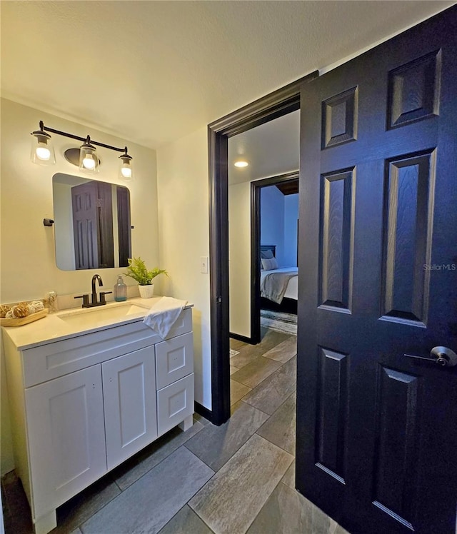 816 Pinewood Ct Unit 3126, Haines City, FL 33844 - bathroom with vanity and ensuite bath