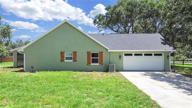 106 Corbett Rd, Lithia, FL 33547 - view of front of property with roof with shingles, a garage, driveway, and stucco siding