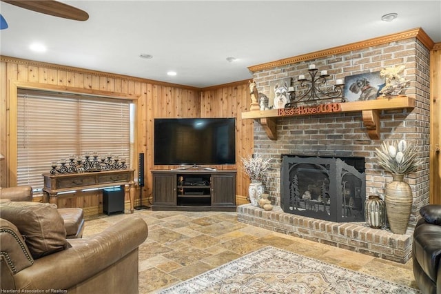 479 State Road 64 E, Zolfo Springs, FL 33890 - living area with stone finish flooring, wood walls, a brick fireplace, a ceiling fan, and crown molding