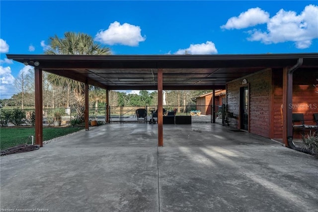 479 State Road 64 E, Zolfo Springs, FL 33890 - view of car parking featuring concrete driveway and a carport