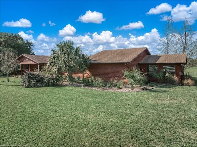 479 State Road 64 E, Zolfo Springs, FL 33890 - view of side of home featuring a yard