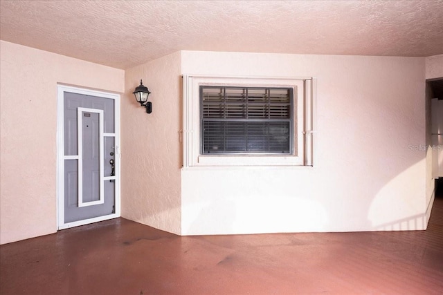 23465 Harborview Rd Unit 223, Punta Gorda, FL 33980 - doorway to property with stucco siding