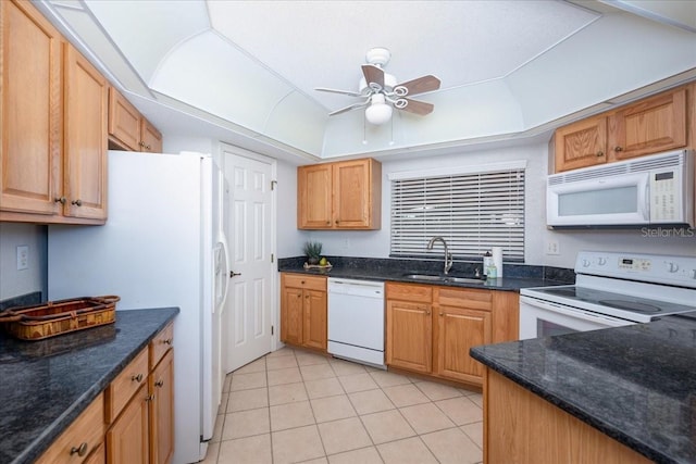 23465 Harborview Rd Unit 223, Punta Gorda, FL 33980 - kitchen featuring white appliances, ceiling fan, light tile patterned flooring, and a tray ceiling