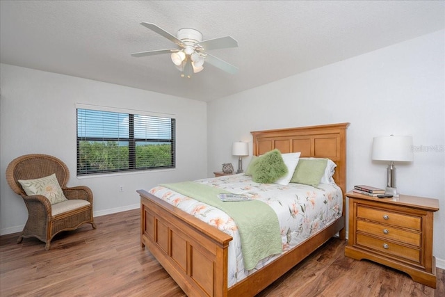 23465 Harborview Rd Unit 223, Punta Gorda, FL 33980 - bedroom featuring light wood-style floors and ceiling fan