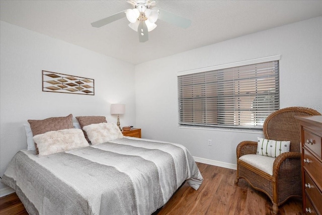 23465 Harborview Rd Unit 223, Punta Gorda, FL 33980 - bedroom featuring wood finished floors and ceiling fan