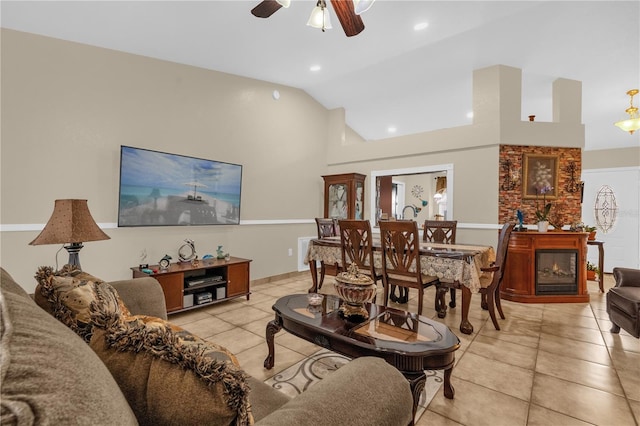 1366 Merrimack Pl, Davenport, FL 33837 - living area featuring lofted ceiling, light tile patterned floors, ceiling fan, and recessed lighting