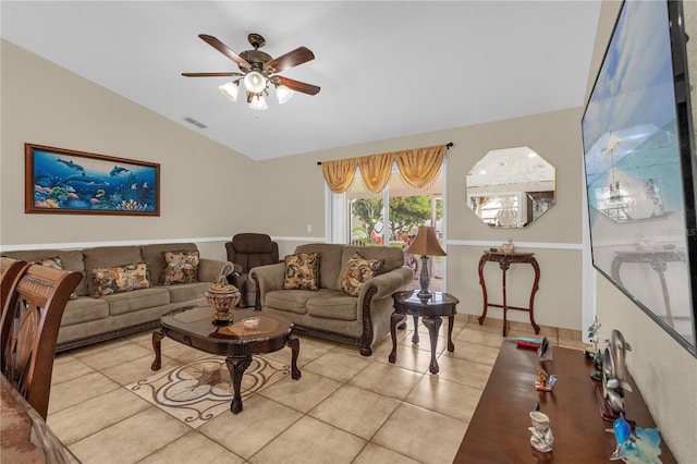 1366 Merrimack Pl, Davenport, FL 33837 - living room with lofted ceiling, light tile patterned floors, and a ceiling fan