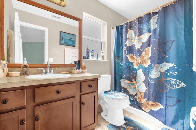 1366 Merrimack Pl, Davenport, FL 33837 - full bathroom featuring vanity and tile patterned flooring