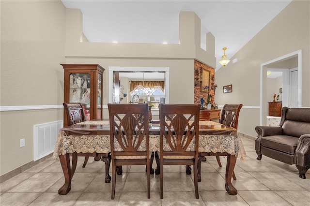 1366 Merrimack Pl, Davenport, FL 33837 - dining room with high vaulted ceiling and light tile patterned floors