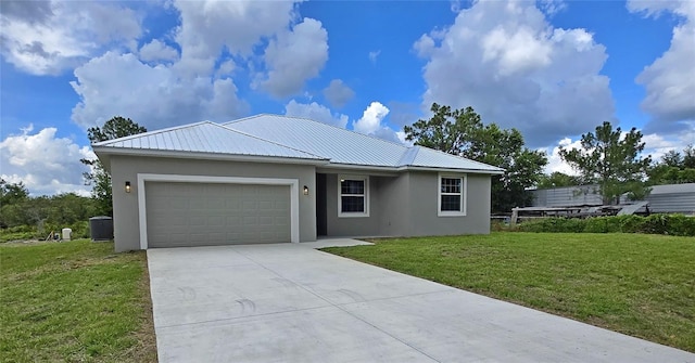 3040 W Joliet Rd, Avon Park, FL 33825 - ranch-style house featuring stucco siding, a garage, concrete driveway, a front lawn, and a metal roof