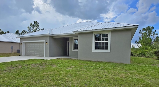 3040 W Joliet Rd, Avon Park, FL 33825 - ranch-style home with stucco siding, driveway, an attached garage, a front lawn, and a metal roof