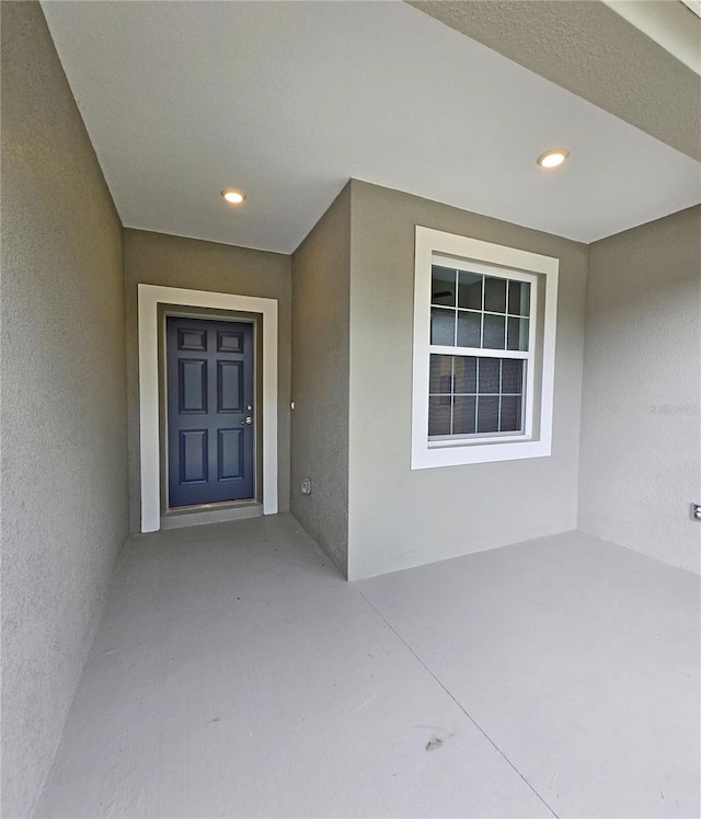 3040 W Joliet Rd, Avon Park, FL 33825 - entrance to property with stucco siding and a patio area