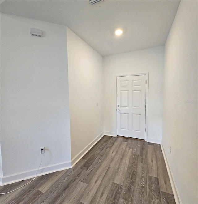 3040 W Joliet Rd, Avon Park, FL 33825 - entryway with dark wood-style flooring and baseboards