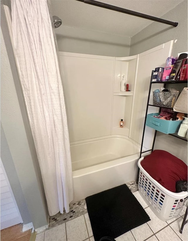7906 Waterview Way Unit 7906, Winter Haven, FL 33884 - bathroom with shower / tub combo and tile patterned flooring