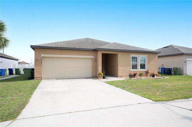 4662 Osprey Way, Winter Haven, FL 33881 - view of front of home featuring stucco siding, an attached garage, concrete driveway, and a front lawn