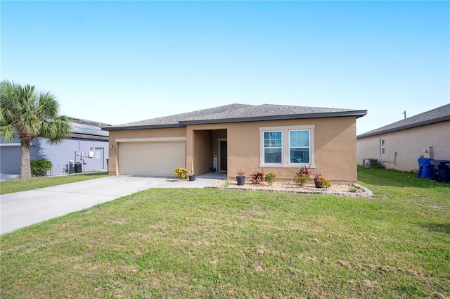 4662 Osprey Way, Winter Haven, FL 33881 - view of front of property featuring a garage, stucco siding, concrete driveway, and a front lawn
