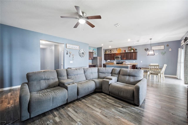 4662 Osprey Way, Winter Haven, FL 33881 - living area featuring a ceiling fan, wood finished floors, and recessed lighting