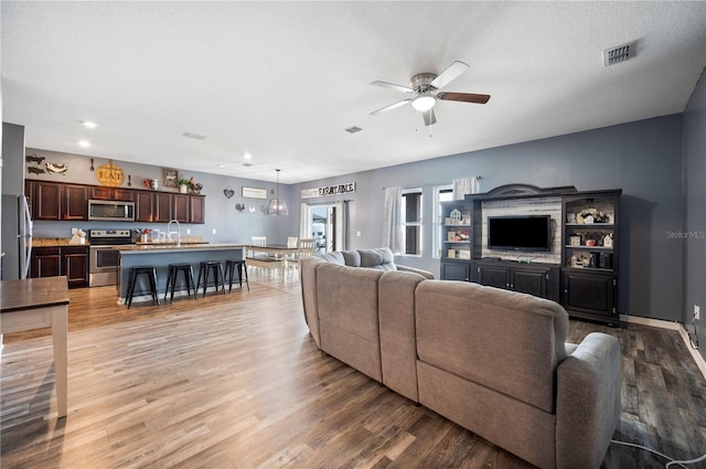 4662 Osprey Way, Winter Haven, FL 33881 - living area featuring ceiling fan, light wood-style flooring, and recessed lighting